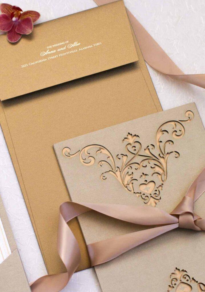 image of lasercut wedding invitation holder with ribbon