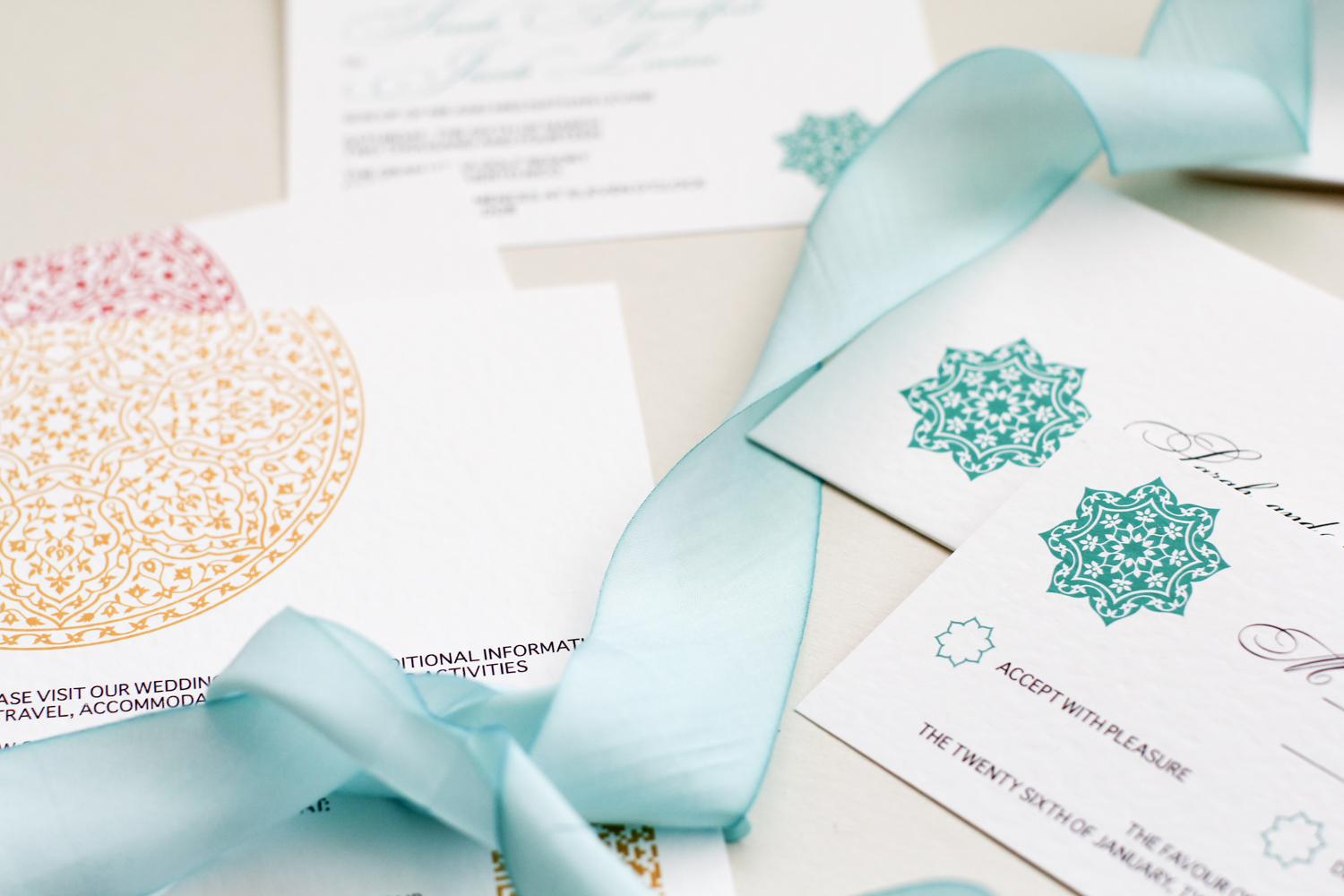 hand dyed silk ribbon with modern rosette design invitation