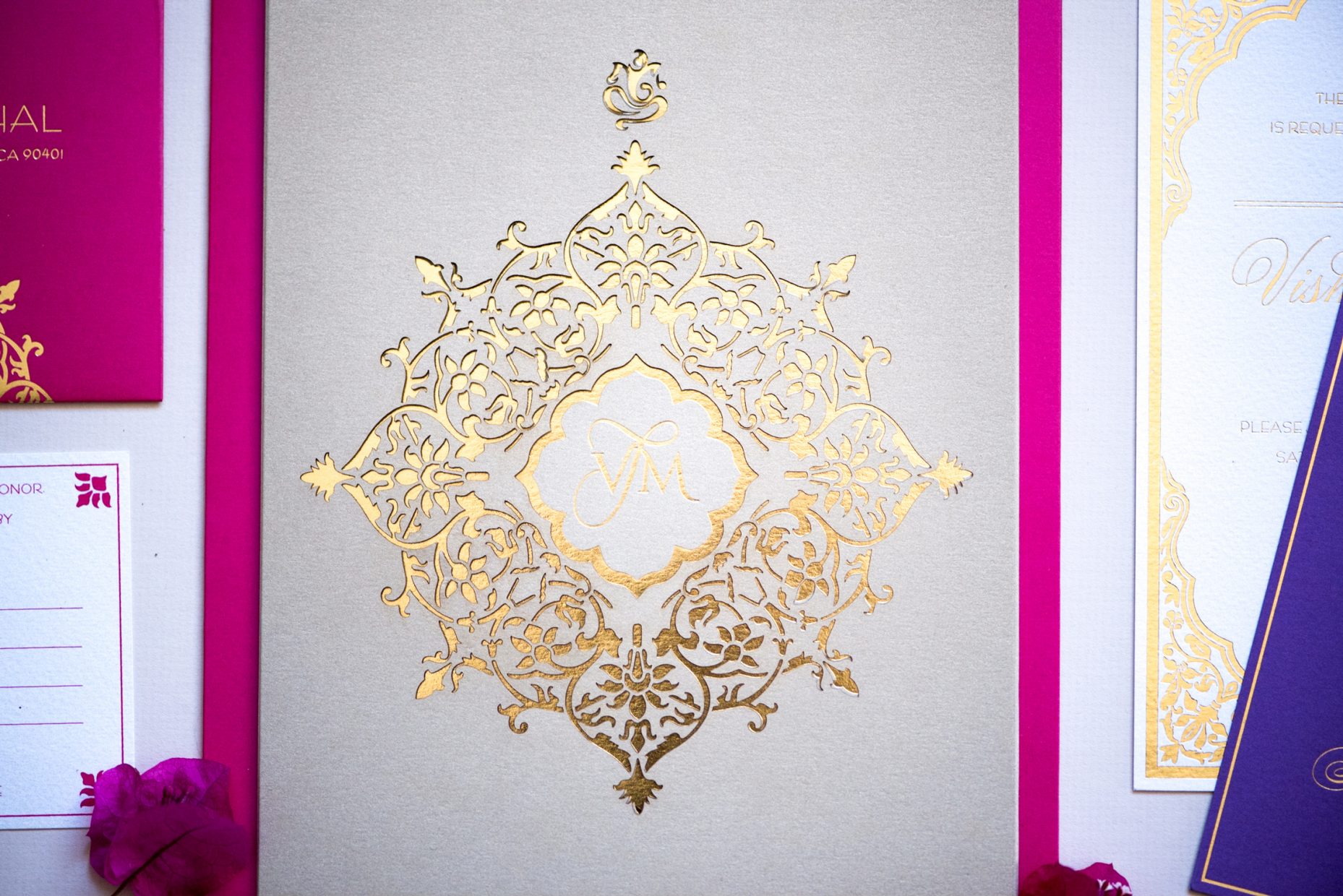 laser cut and gold monogram invitation design for luxury wedding