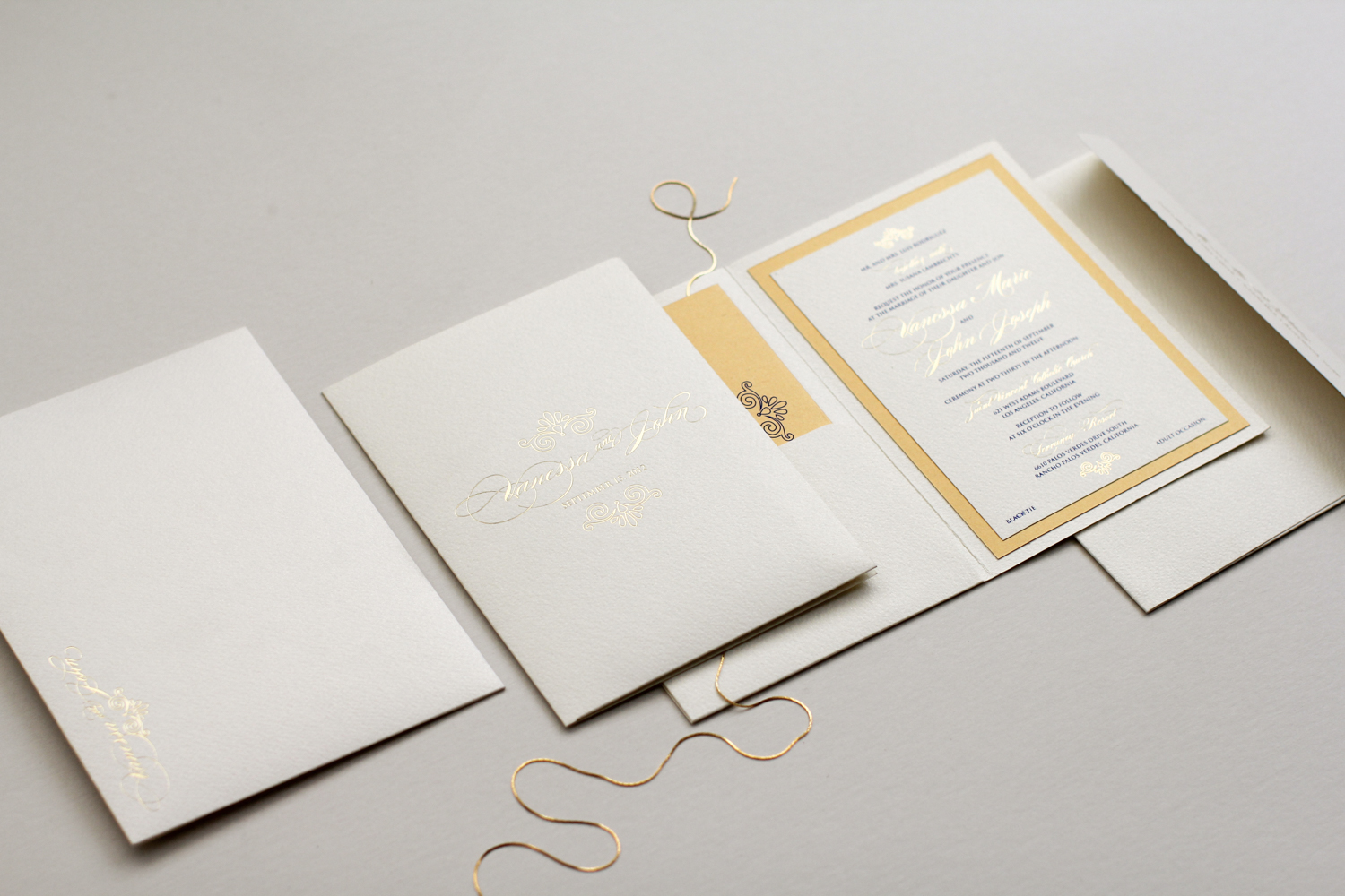 gold foil pocket invitation with seashell inspired motif | AZURE