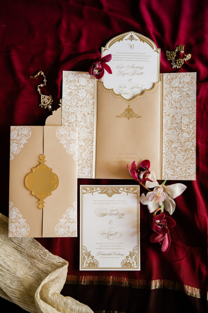 Image of designer wedding invitation with gold accents