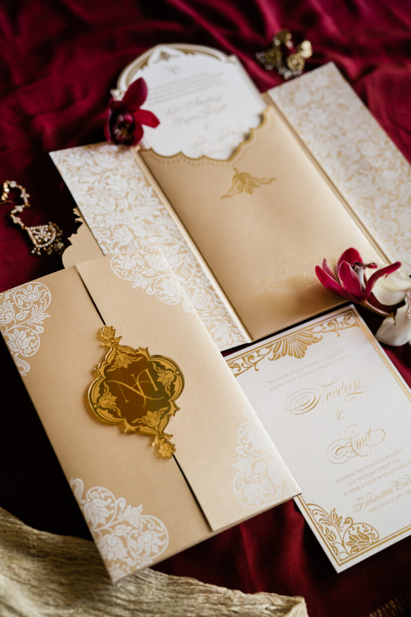 Image of designer wedding invitation with gold accents