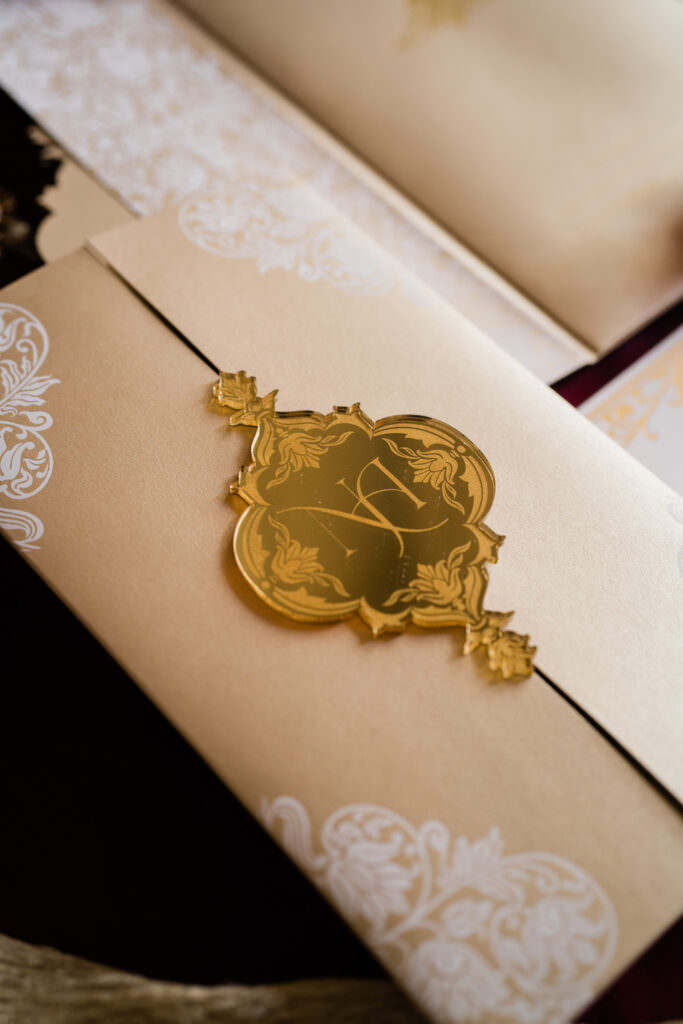 Image of designer wedding invitation with gold mirror acrylic
