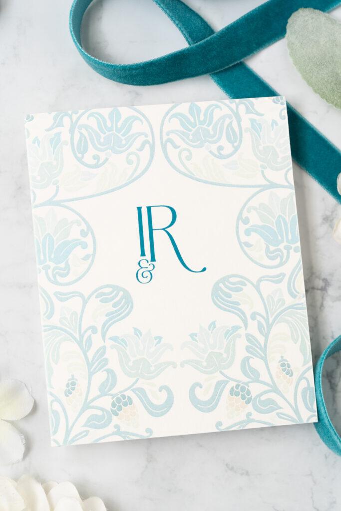 folded detail card with monogram