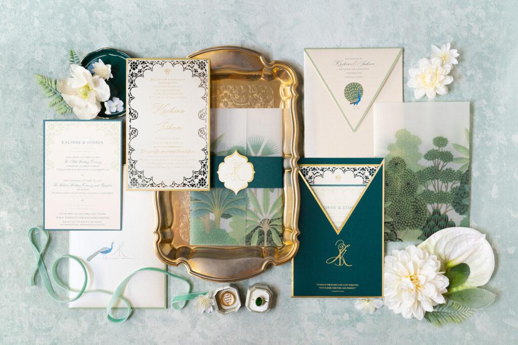 Tropical garden themed invitation suite with gold foil, laser cut and vellum wrap